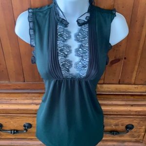New express blouse sleeveless with embroidery around the breast area